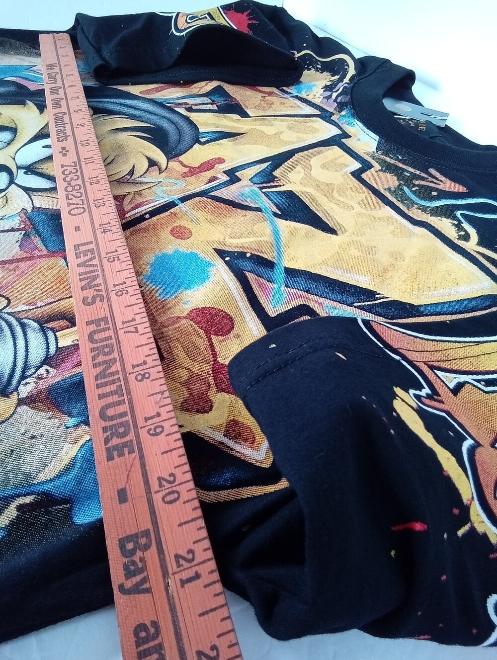 Apple Black Taz AOP Graphic Tee with Gold Logo and Multicolor Front Print - Picture 9 of 10
